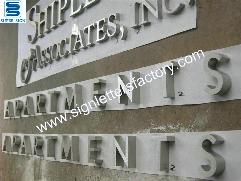 Built-up brushed stainless steel letter signage